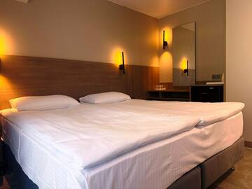 Двухместный улучшенный номер с балконом в Хостеле Магнолия