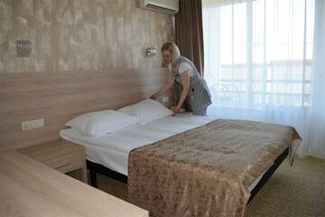 Стандартный номер с двуспальной кроватью в Хостеле Магнолия