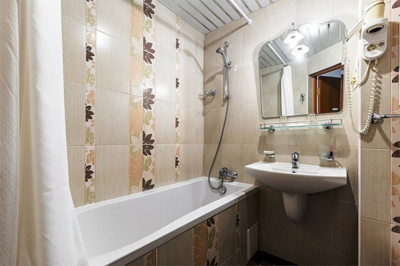 Фотографии номера Однокомнатный номер улучшенной планировки с двуспальной кроватью в Хостеле Магнолия Сочи