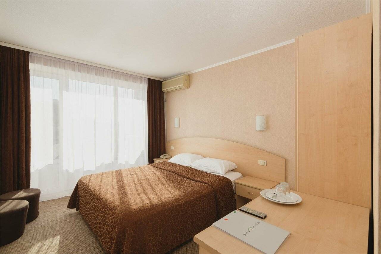 Фотографии номера Стандартный номер с двуспальной кроватью в Хостеле Магнолия Сочи