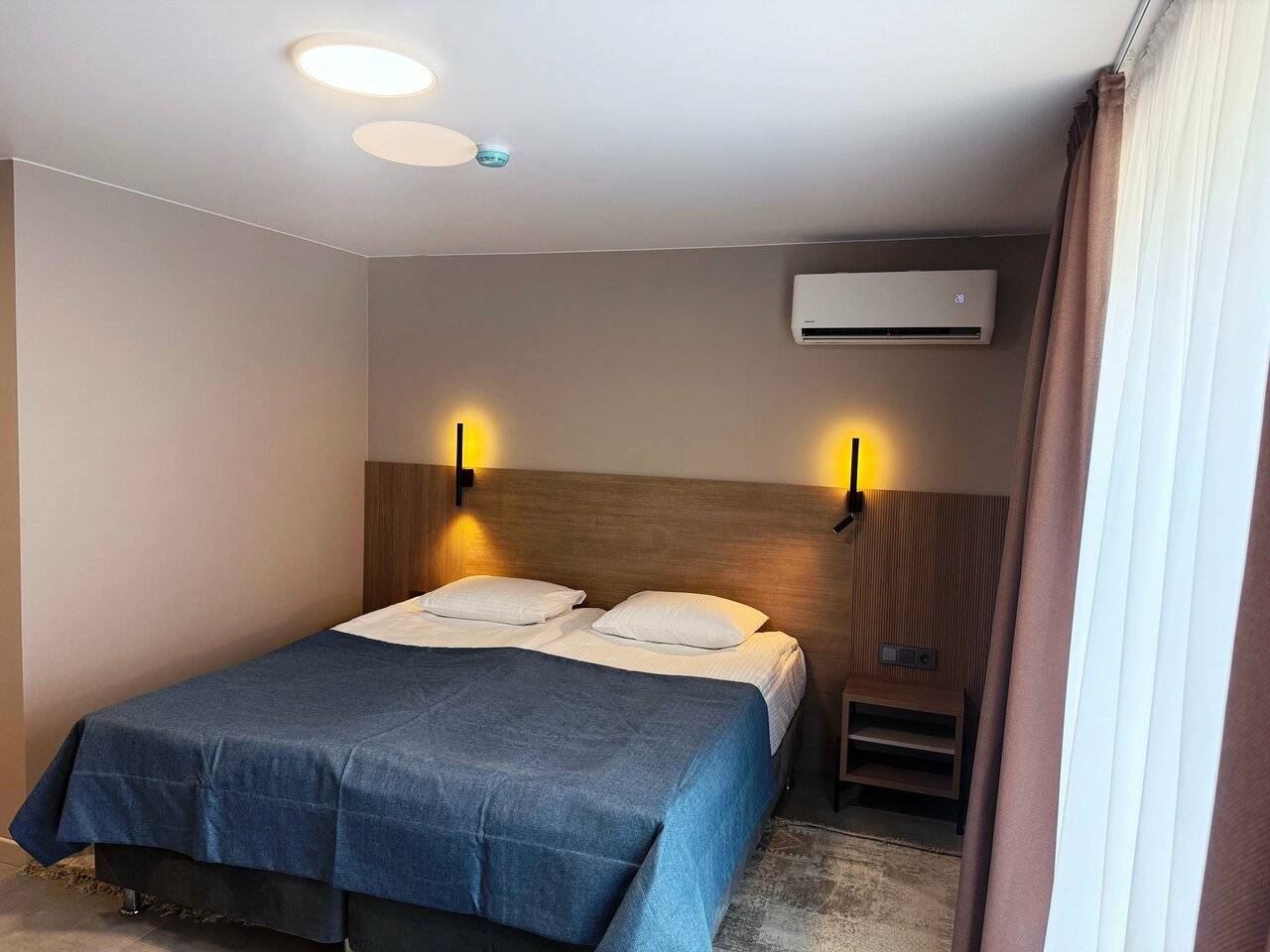 Фотографии номера Двухкомнатный люкс без балкона в Хостеле Магнолия Сочи