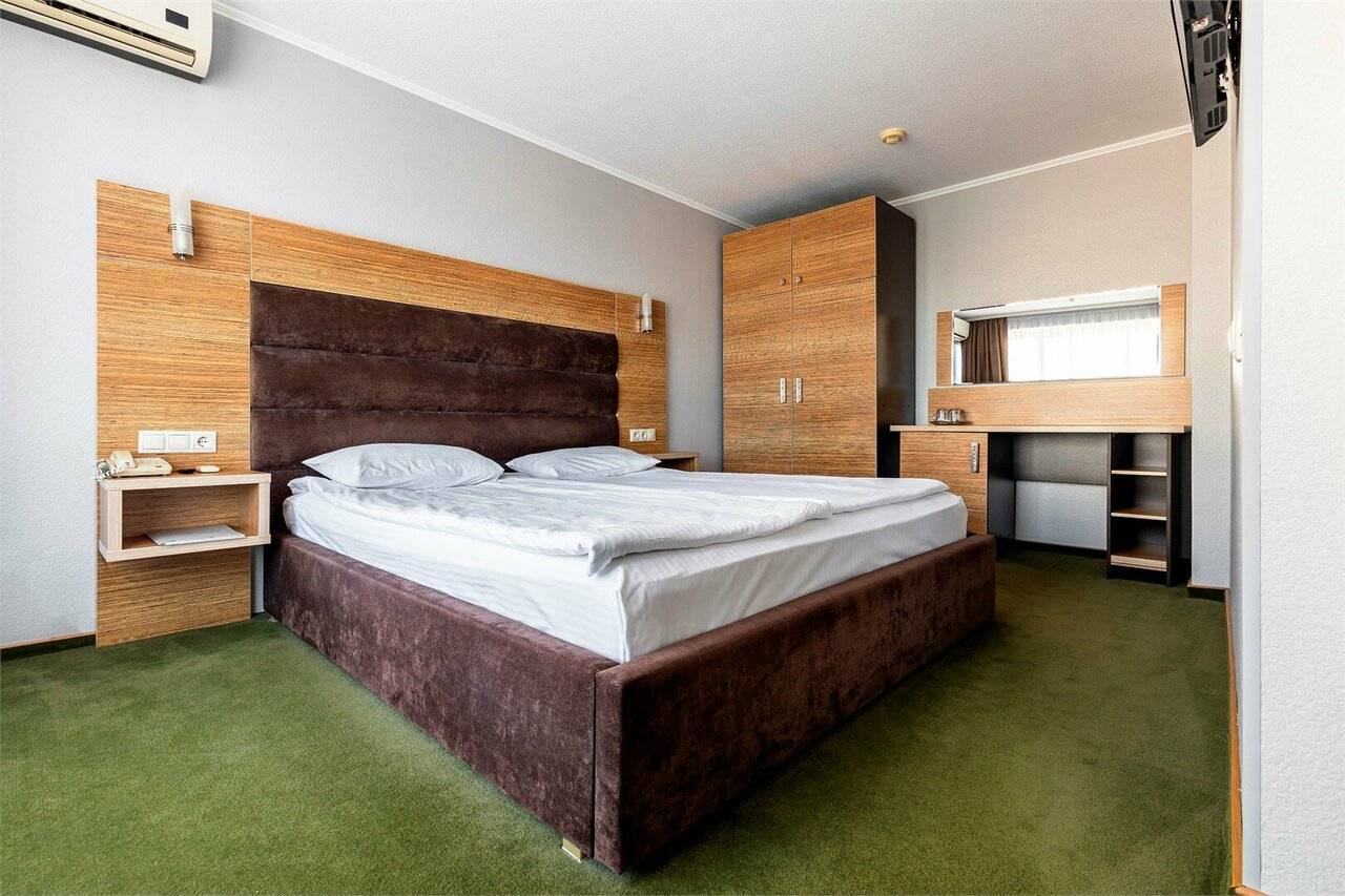 Фотографии номера Однокомнатный номер улучшенной планировки с двуспальной кроватью в Хостеле Магнолия Сочи