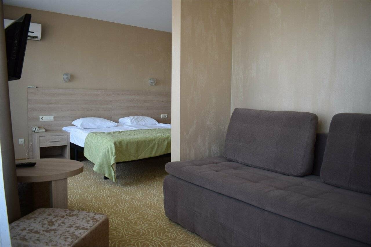 Фотографии номера Однокомнатный номер улучшенной планировки с двуспальной кроватью в Хостеле Магнолия Сочи