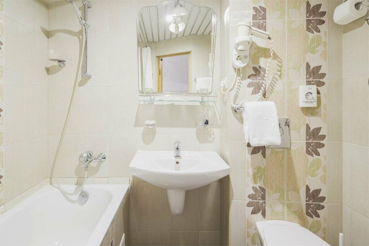 Фотографии номера Однокомнатный номер улучшенной планировки с 2-мя раздельными кроватями в Хостеле Магнолия Сочи