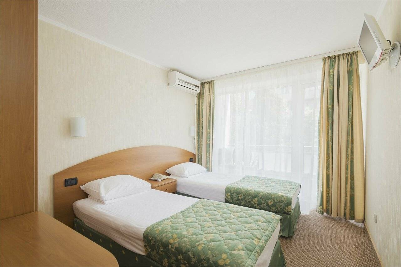 Фотографии номера Стандартный номер с 2-мя односпальными кроватями в Хостеле Магнолия Сочи