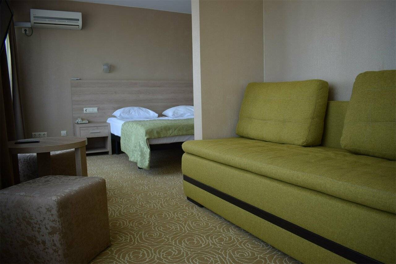 Фотографии номера Однокомнатный номер улучшенной планировки с двуспальной кроватью в Хостеле Магнолия Сочи