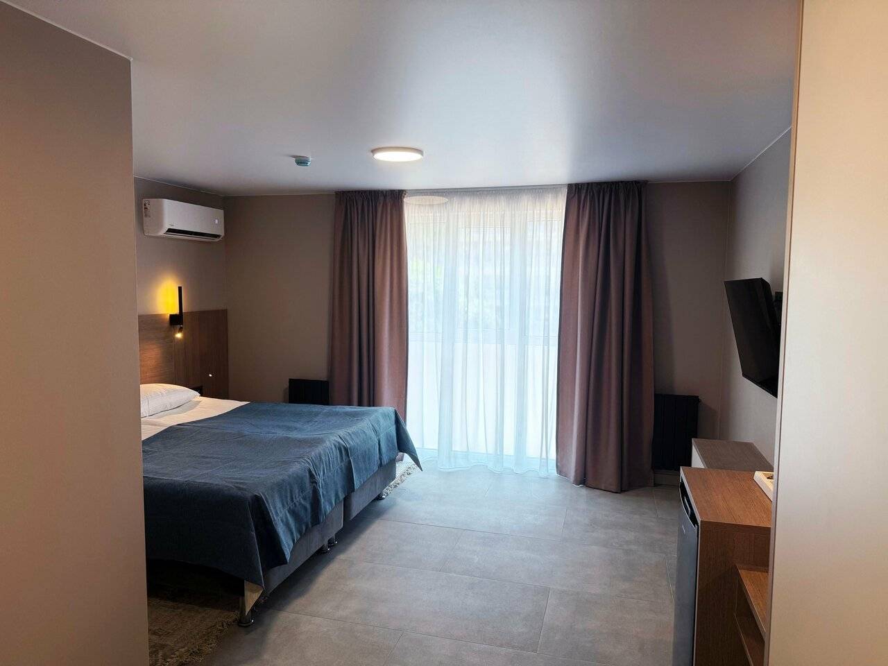 Фотографии номера Двухкомнатный люкс без балкона в Хостеле Магнолия Сочи