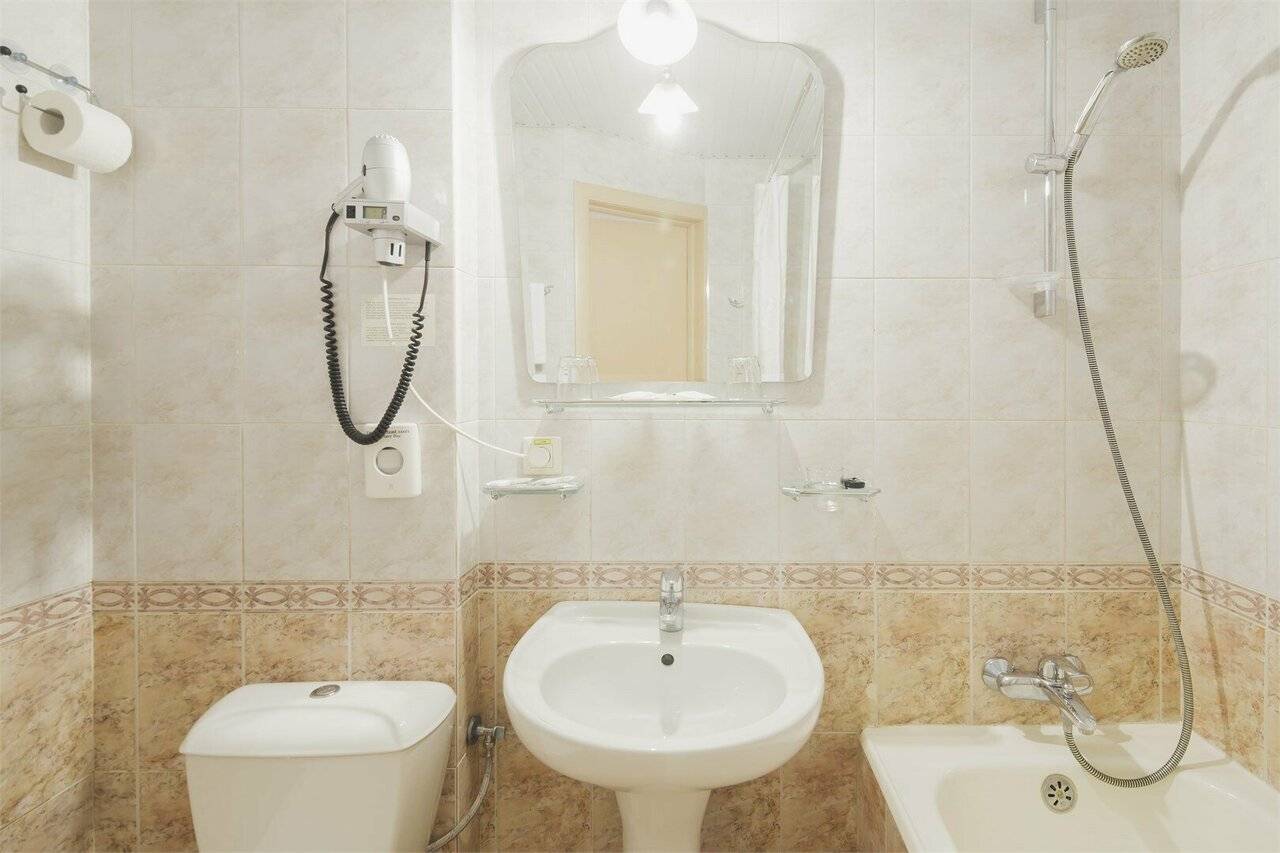 Фотографии номера Однокомнатный номер улучшенной планировки с двуспальной кроватью в Хостеле Магнолия Сочи