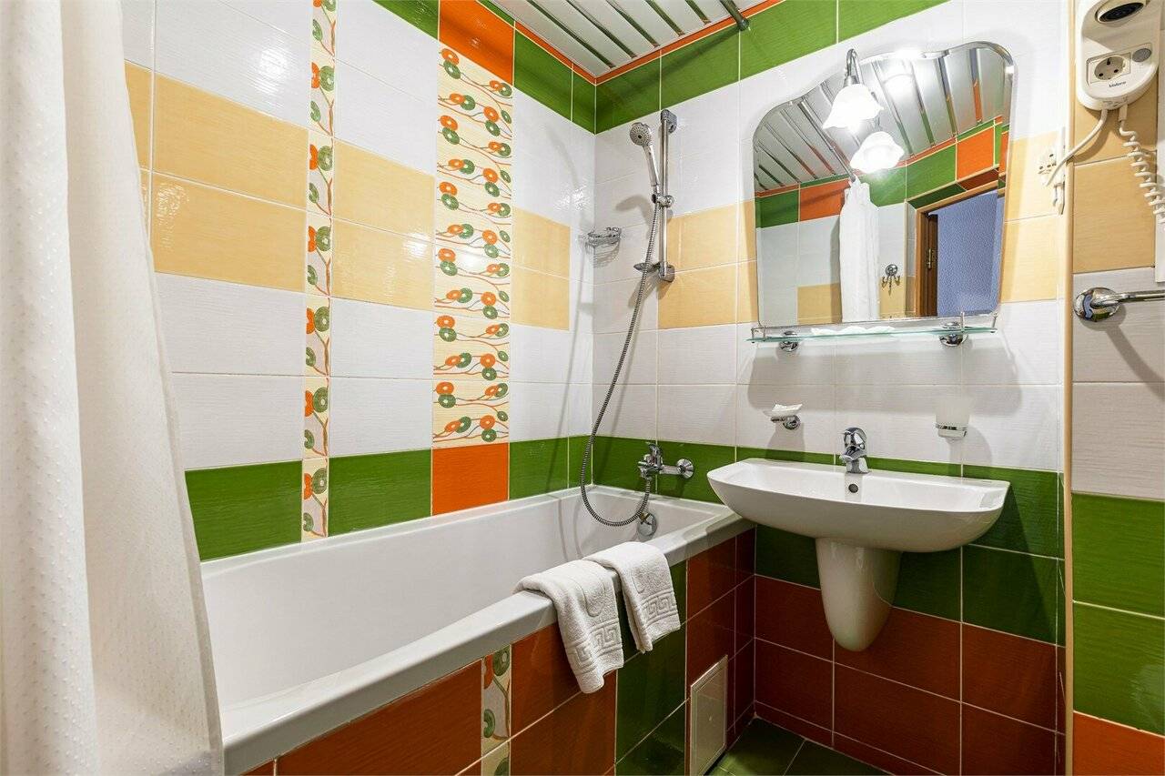 Фотографии номера Однокомнатный номер улучшенной планировки с двуспальной кроватью в Хостеле Магнолия Сочи