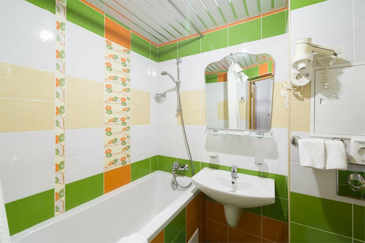 Фотографии номера Однокомнатный номер улучшенной планировки с двуспальной кроватью в Хостеле Магнолия Сочи