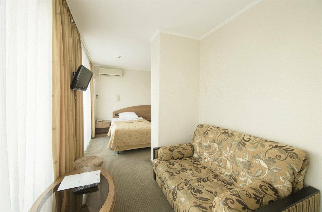 Фотографии номера Однокомнатный номер улучшенной планировки с 2-мя раздельными кроватями в Хостеле Магнолия Сочи