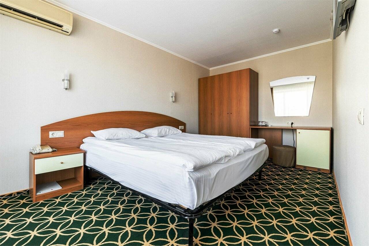 Фотографии номера Однокомнатный номер улучшенной планировки с двуспальной кроватью в Хостеле Магнолия Сочи