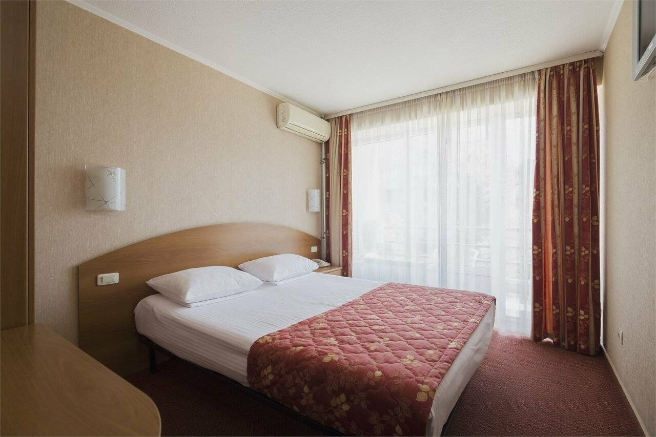 Фотографии номера Стандартный номер с двуспальной кроватью в Хостеле Магнолия Сочи