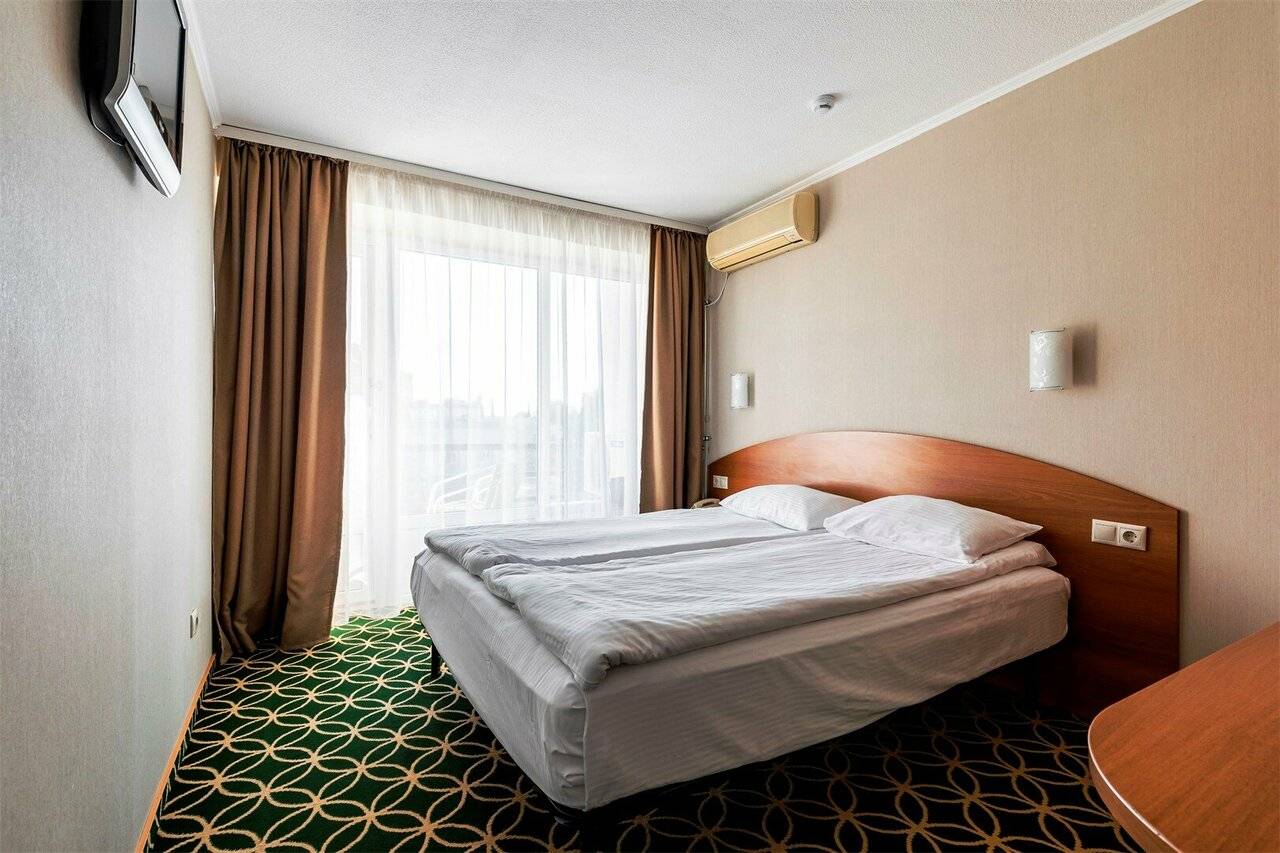 Фотографии номера Стандартный номер с двуспальной кроватью в Хостеле Магнолия Сочи