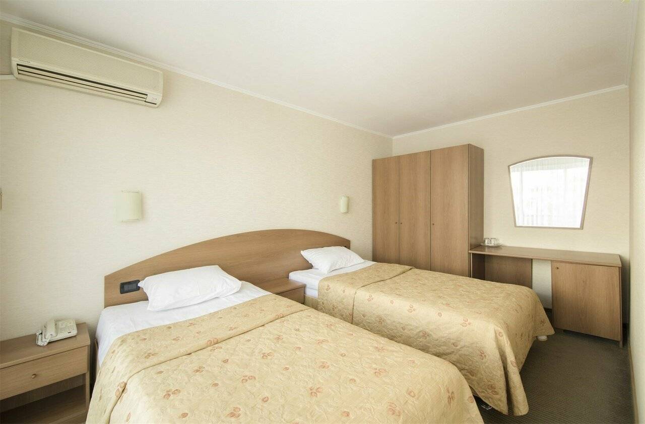 Фотографии номера Однокомнатный номер улучшенной планировки с 2-мя раздельными кроватями в Хостеле Магнолия Сочи